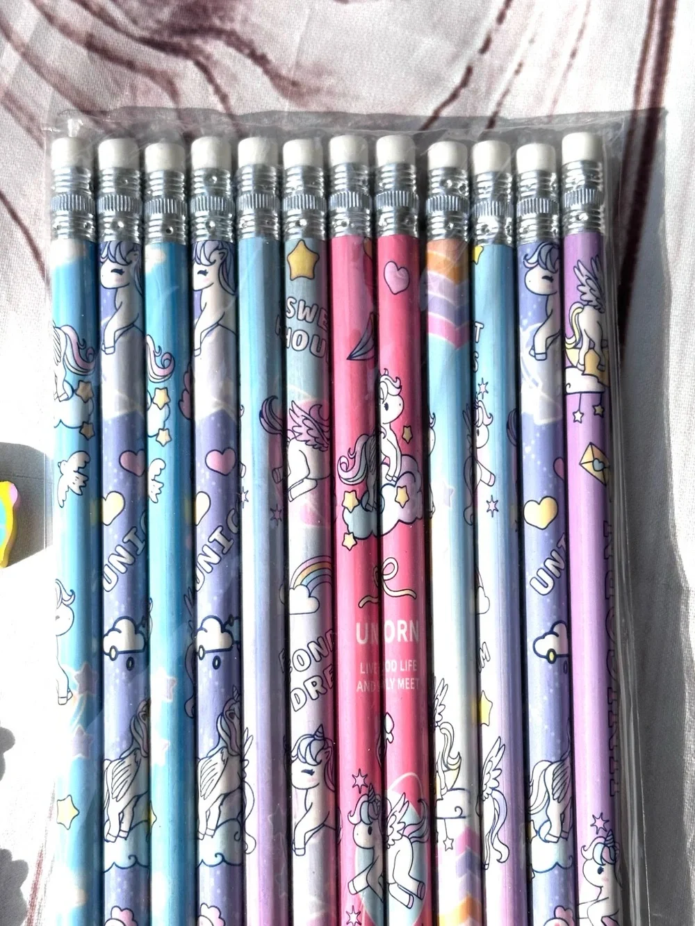 12 Rainbow Unicorn Pencil Set with Pastel Designs and Eraser Toppers